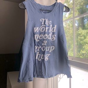 Blue-gray Zoe + liv, Medium tank with phrase- “ The World needs a big group hug”